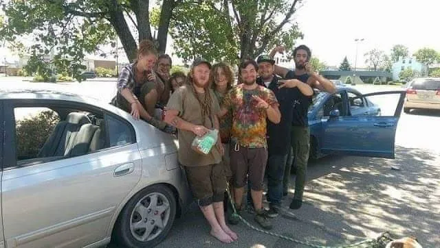 Road family gathered beside a car, from the original DKCSC site